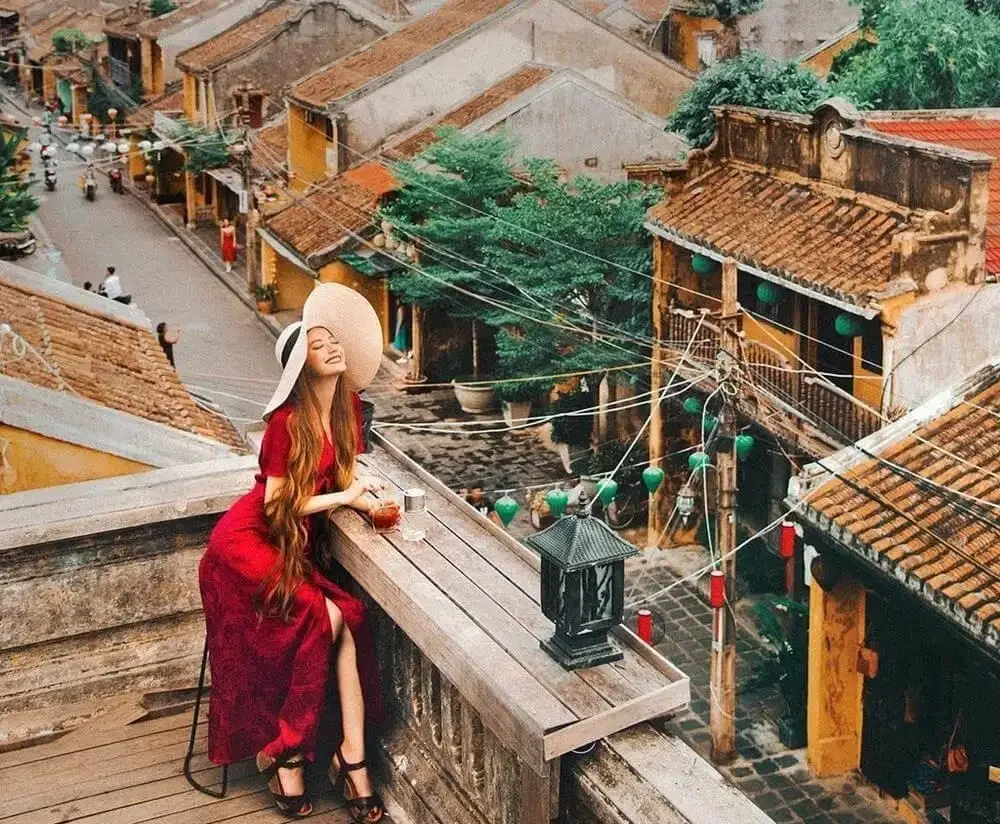 woman enjoying the view over Hoi An Ancient Town