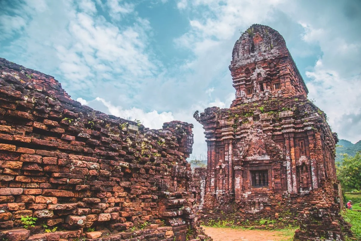 Ancient red brick towers show My Son Sanctuary history