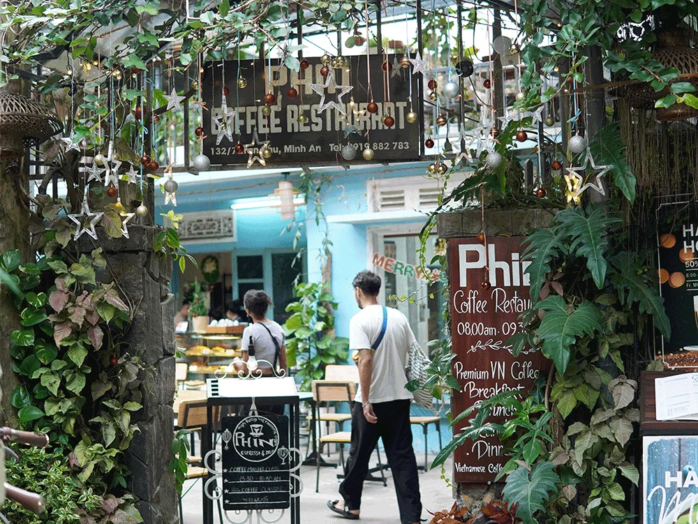 Entrance to Phin Coffee, a tranquil garden cafe offering some of the best egg coffee in Hoi An.