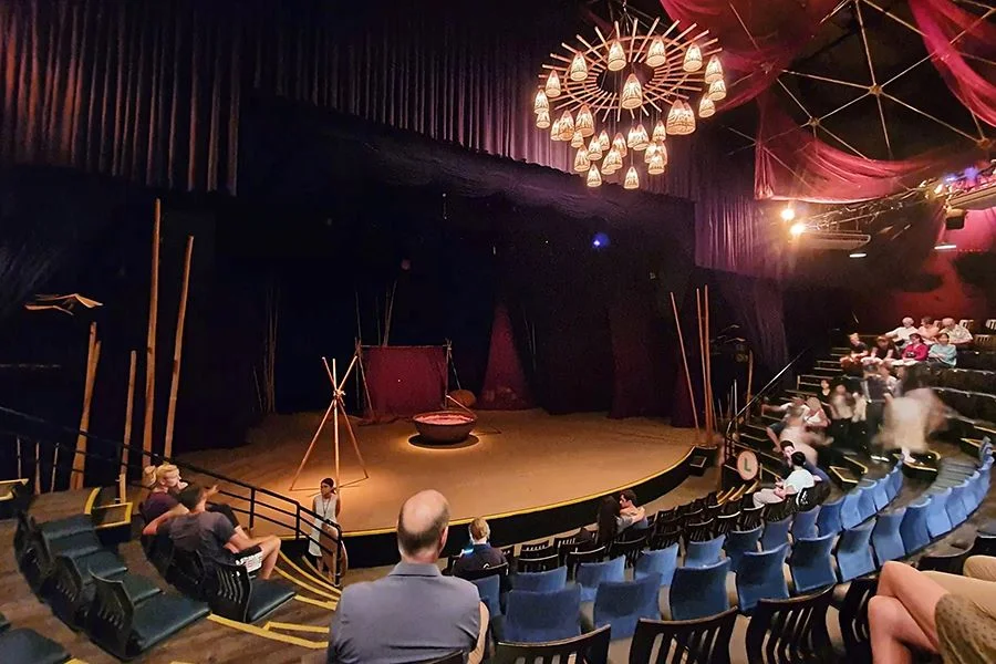 Audience seating and the stage setup inside the distinctive bamboo dome venue of the Hoi An Bamboo Circus.