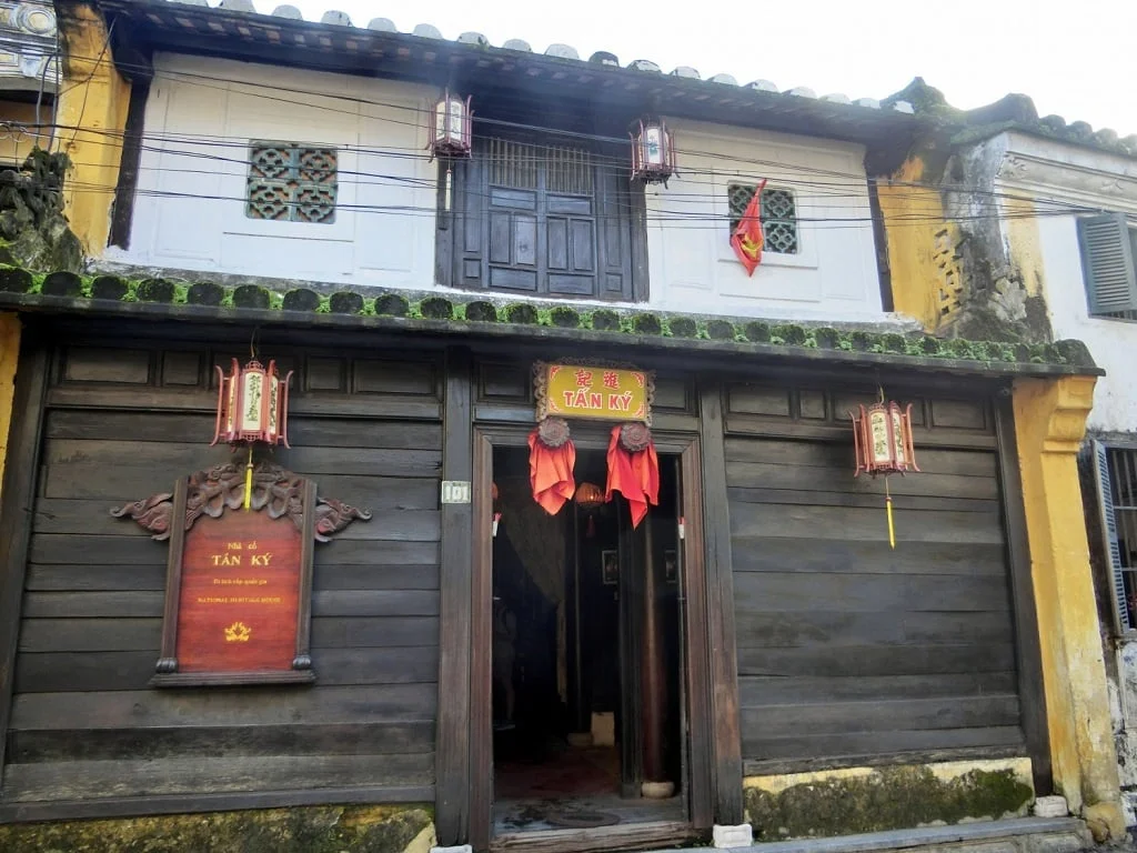 Exterior of the historic Tan Ky Ancient House in Hoi An with traditional wooden facade and decorative lanterns