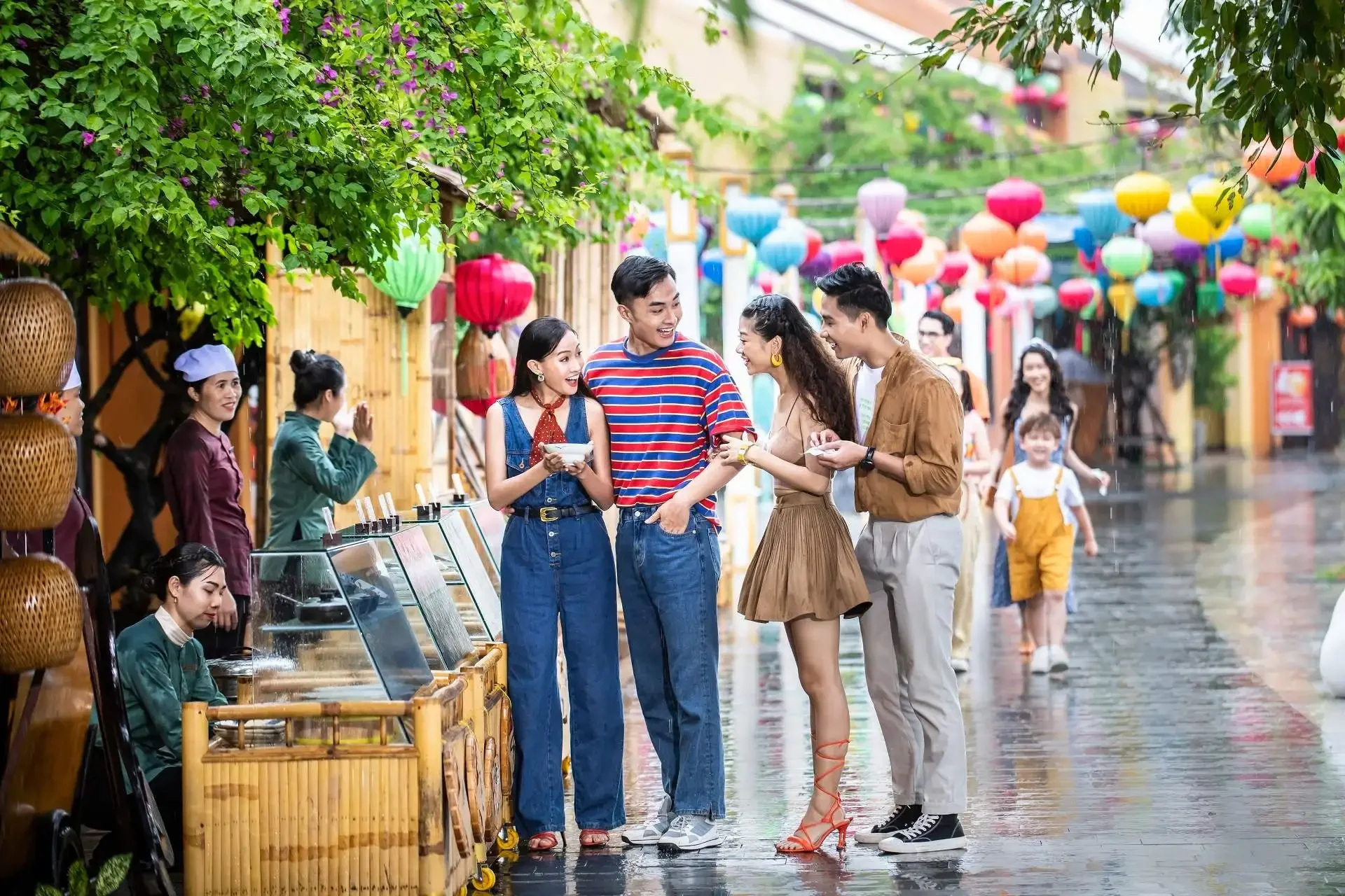 Young adults enjoying the vibrant atmosphere of Hoi An Ancient Town