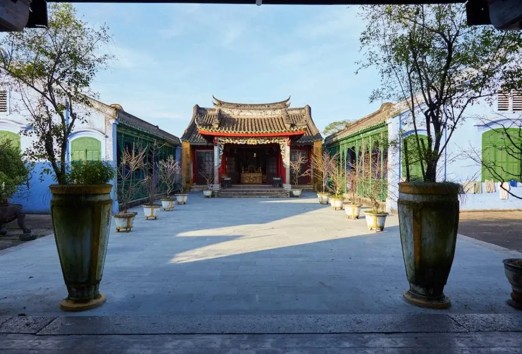 Tranquil stone courtyard inside Cantonese Assembly Hall Hoi An