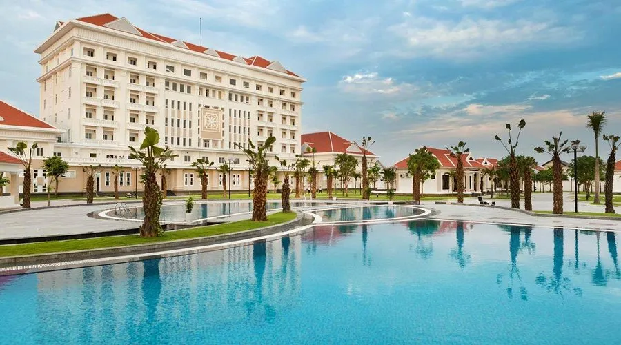 Large hotel and outdoor swimming pool located near tam thanh mural village.
