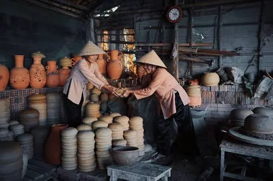 Women make pottery at Thanh Ha Village near the Thu Bon River Hoi An.