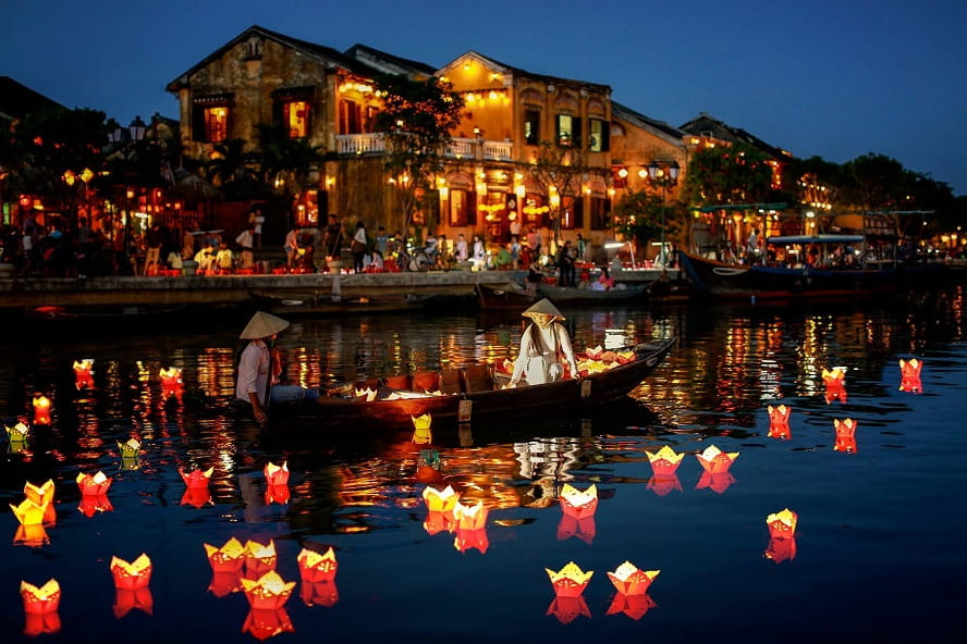 Floating a lantern on the Hoai River